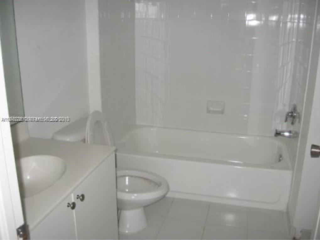 15480 Southwest 284th Street, Unit 2304 Homestead, FL 33033 - Photo 17 of 31 a bathroom with a sink and toilet