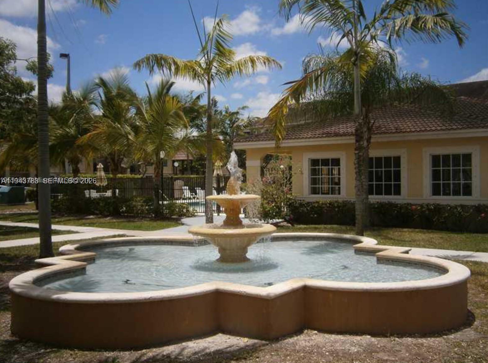 15480 Southwest 284th Street, Unit 2304 Homestead, FL 33033 - Photo 28 of 31 a view of a house with backyard and swimming pool