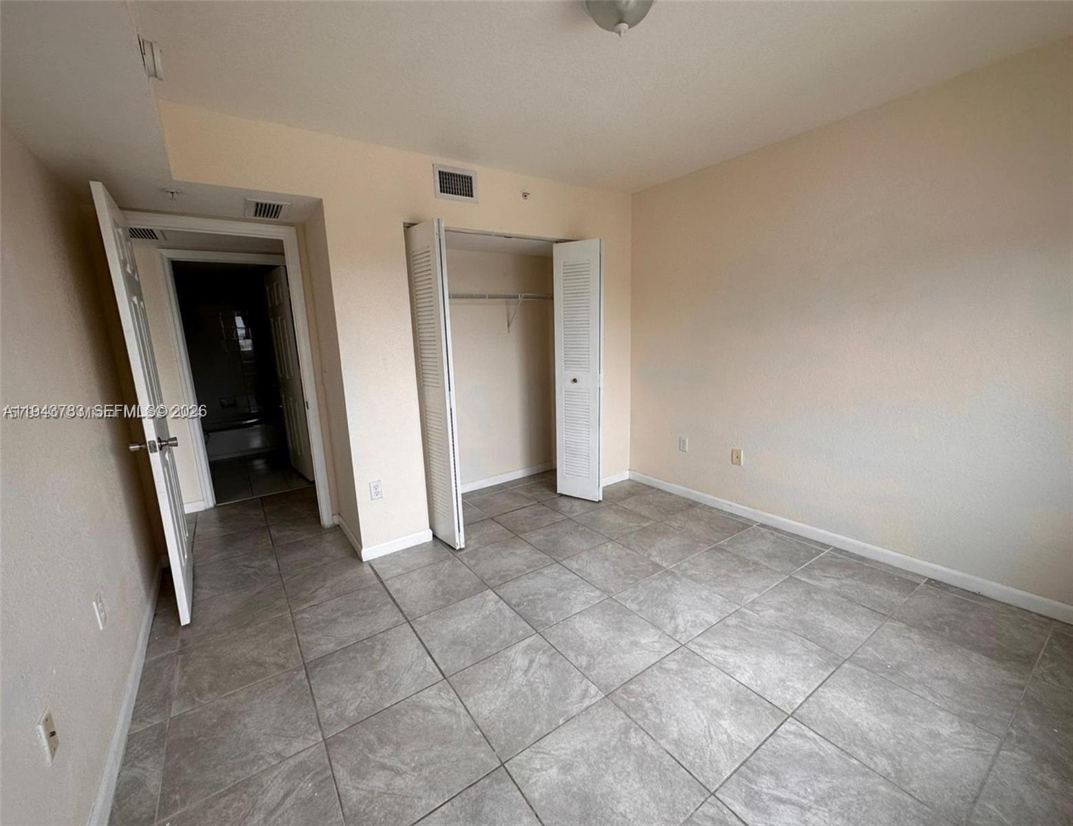 15480 Southwest 284th Street, Unit 2304 Homestead, FL 33033 - Photo 9 of 31 a view of a utility room with closet