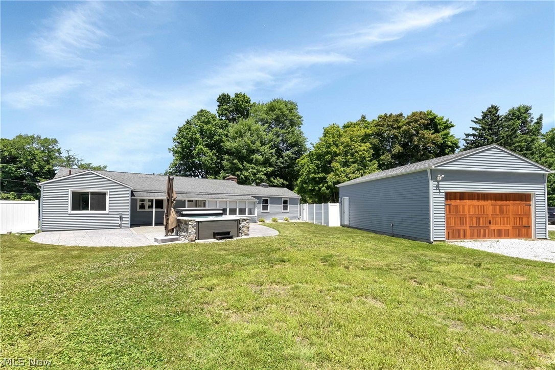 29514 Ridge Road Wickliffe, OH 44092 - Photo 9 of 49 View of yard with a swim spa and a patio