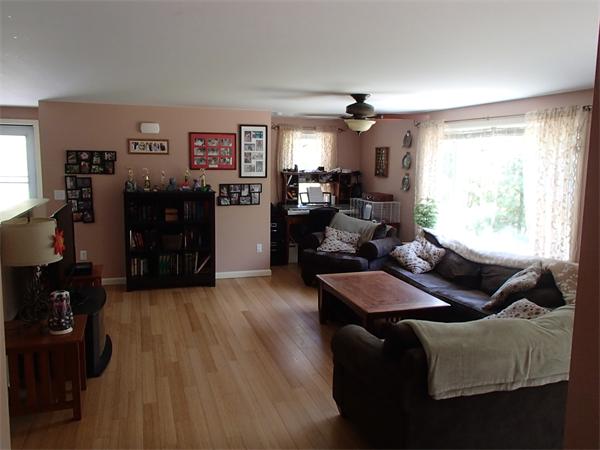 24 Ed Clark Road Colrain, MA 01340 - Photo 14 of 25 a living room with furniture and a window