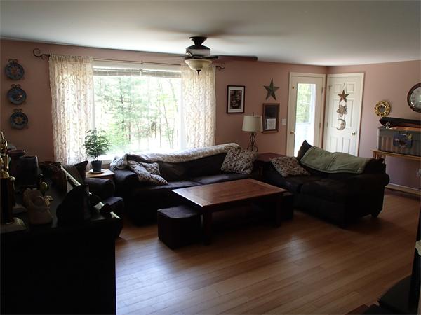 24 Ed Clark Road Colrain, MA 01340 - Photo 15 of 25 a living room with furniture window and wooden floor