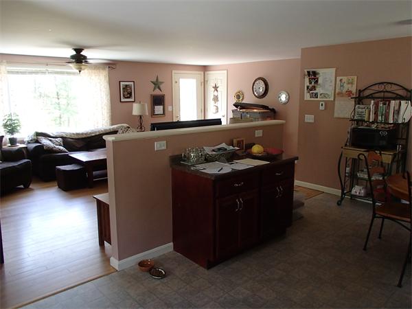 24 Ed Clark Road Colrain, MA 01340 - Photo 16 of 25 a living room with furniture and a window