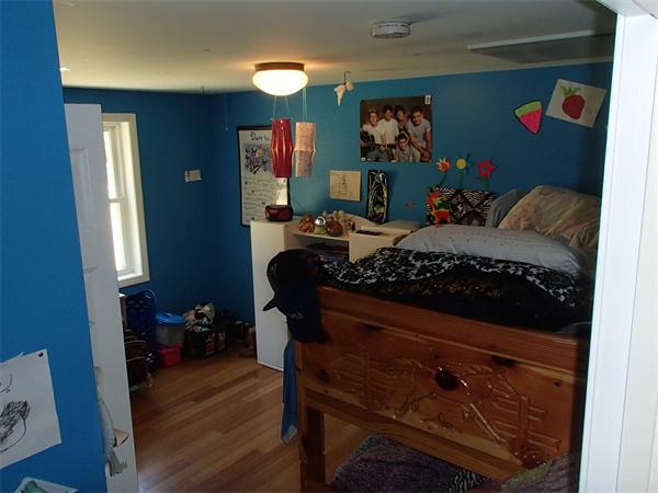 24 Ed Clark Road Colrain, MA 01340 - Photo 18 of 25 a room with furniture and wooden floor