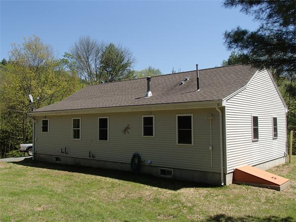 24 Ed Clark Road Colrain, MA 01340 - Photo 4 of 25 a front view of house with yard