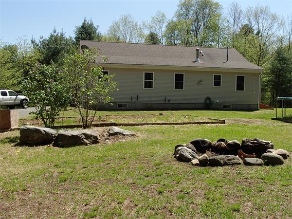 24 Ed Clark Road Colrain, MA 01340 - Photo 5 of 25 a view of a house with a yard