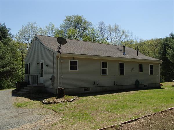 24 Ed Clark Road Colrain, MA 01340 - Photo 6 of 25 a house with trees in the background