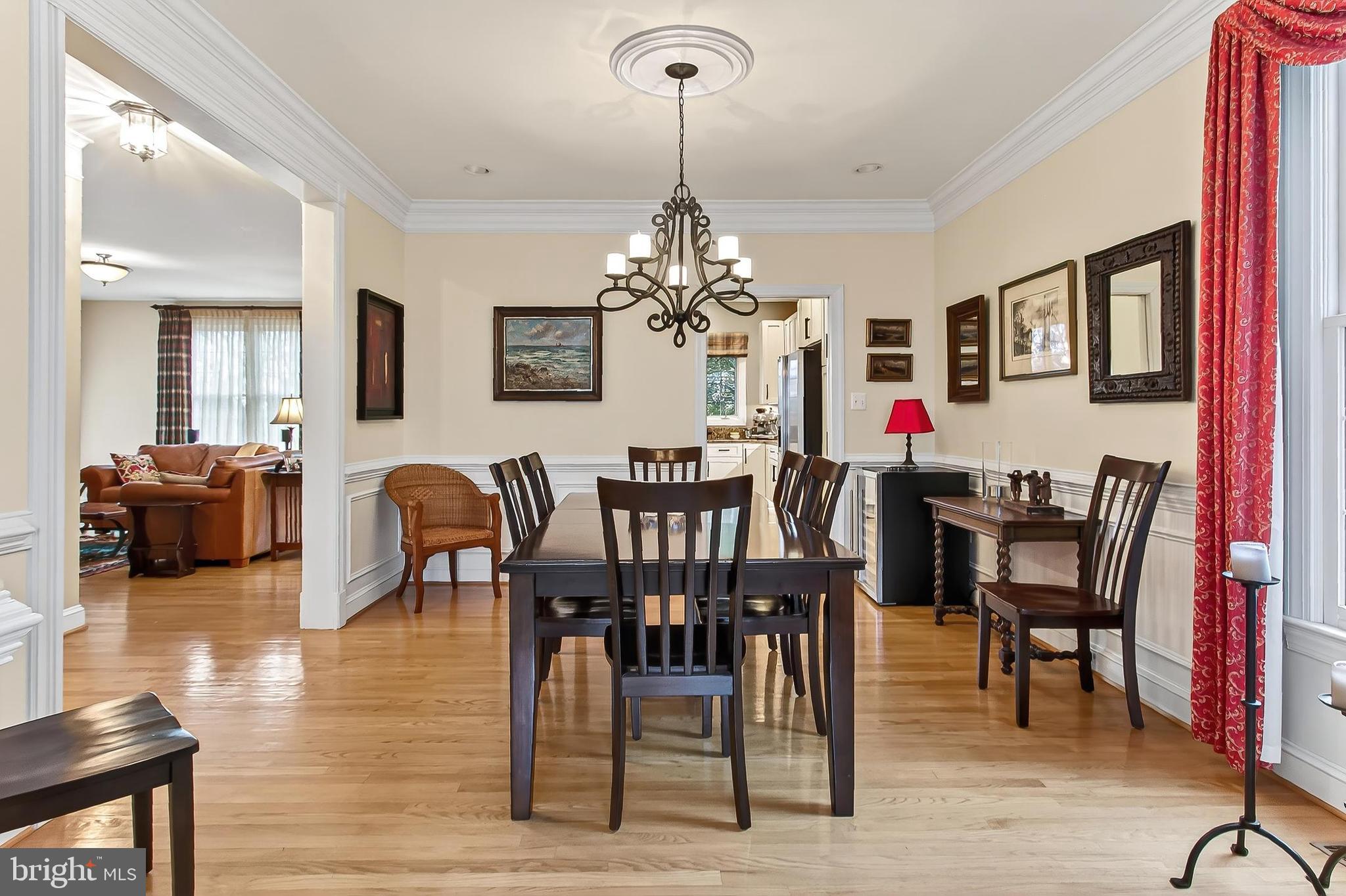 4818 9th Street South Arlington, VA 22204 - Photo 12 of 57 a view of a dining room with furniture and chandelier