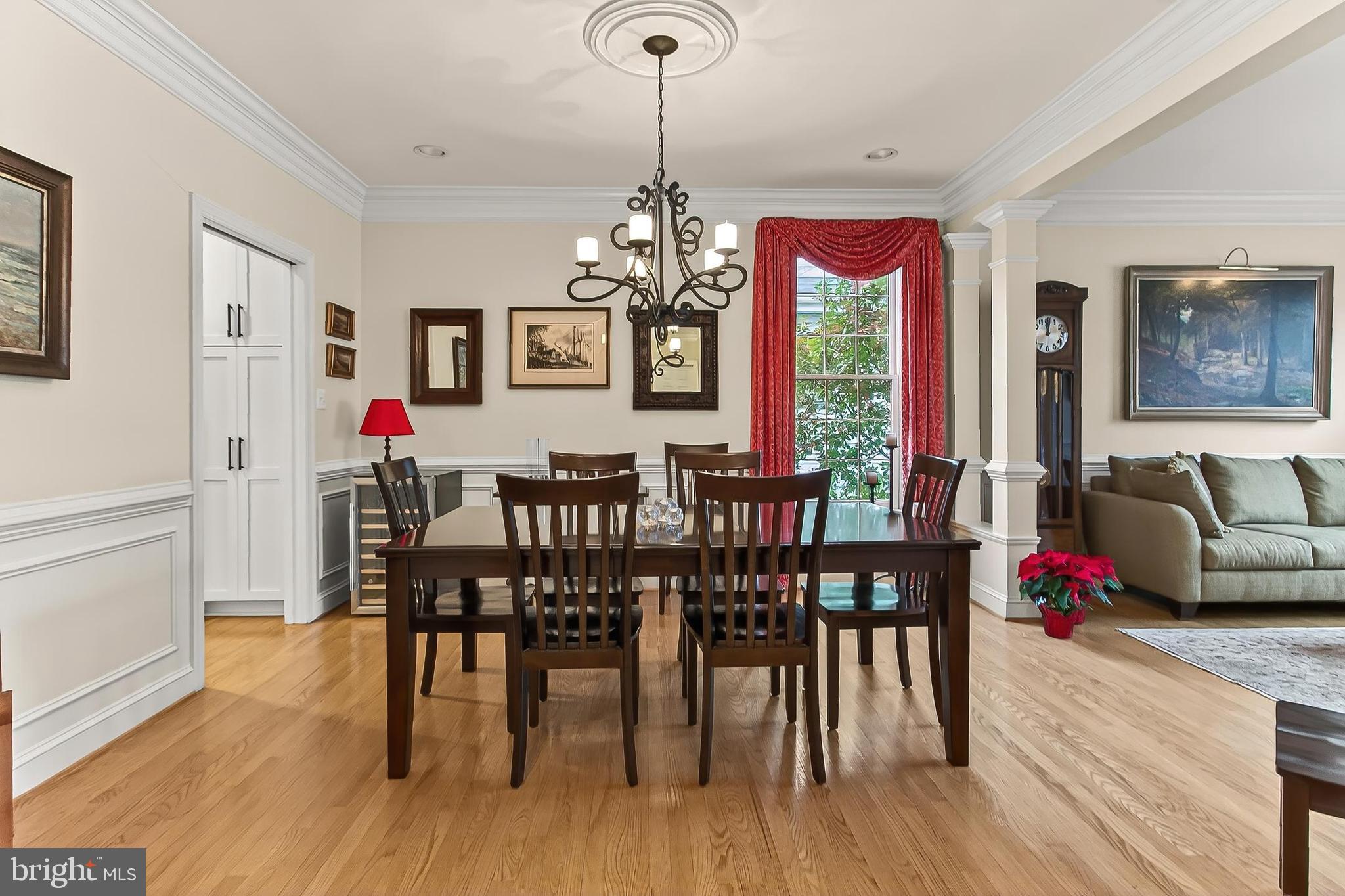 4818 9th Street South Arlington, VA 22204 - Photo 13 of 57 a view of a dining room with furniture window and wooden floor