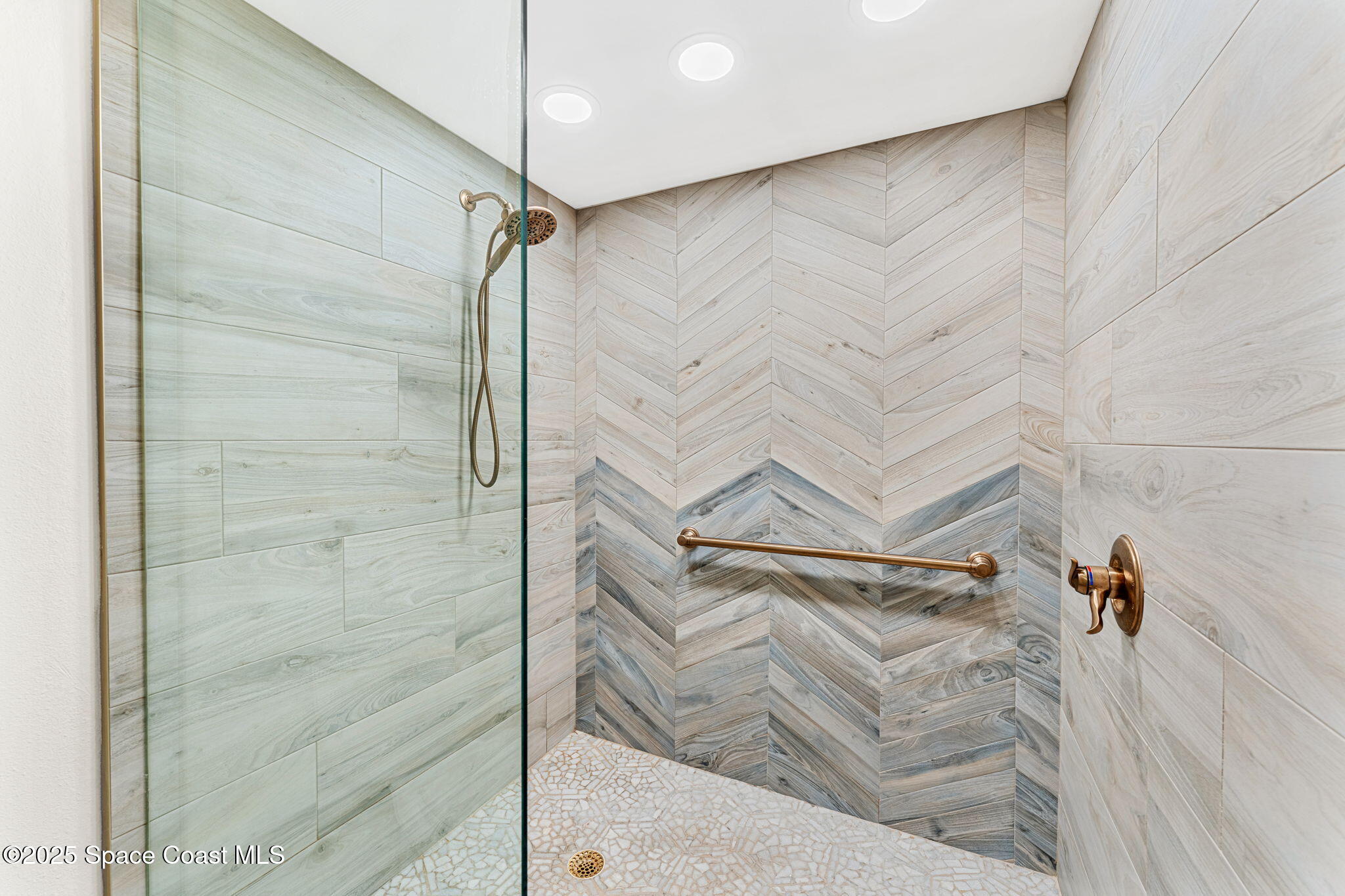 2220 Front Street, Unit 404 Melbourne, FL 32901 - Photo 37 of 51 a bathroom with a shower and a shower