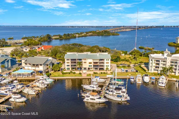 a kitchen with stainless steel appliances granite countertop wooden cabinets a stove top oven a sink and dishwasher