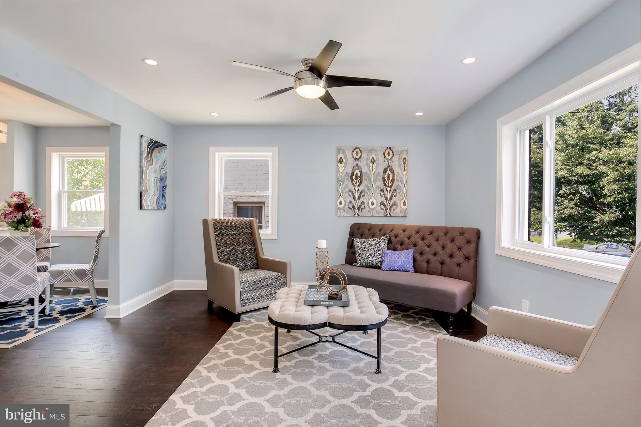 4928 Sargent Road Northeast Washington, DC 20017 - Photo 6 of 30 a living room with furniture and a large window