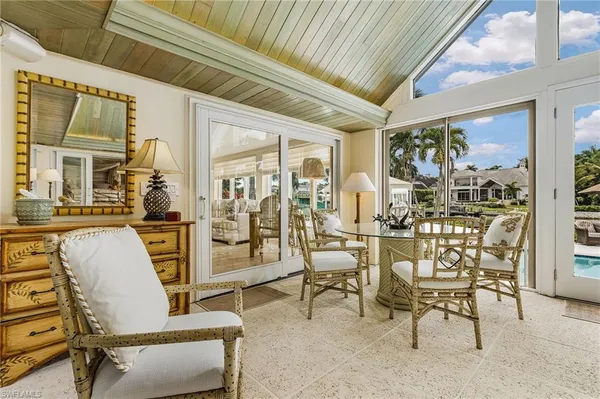 a view of a livingroom with furniture and window