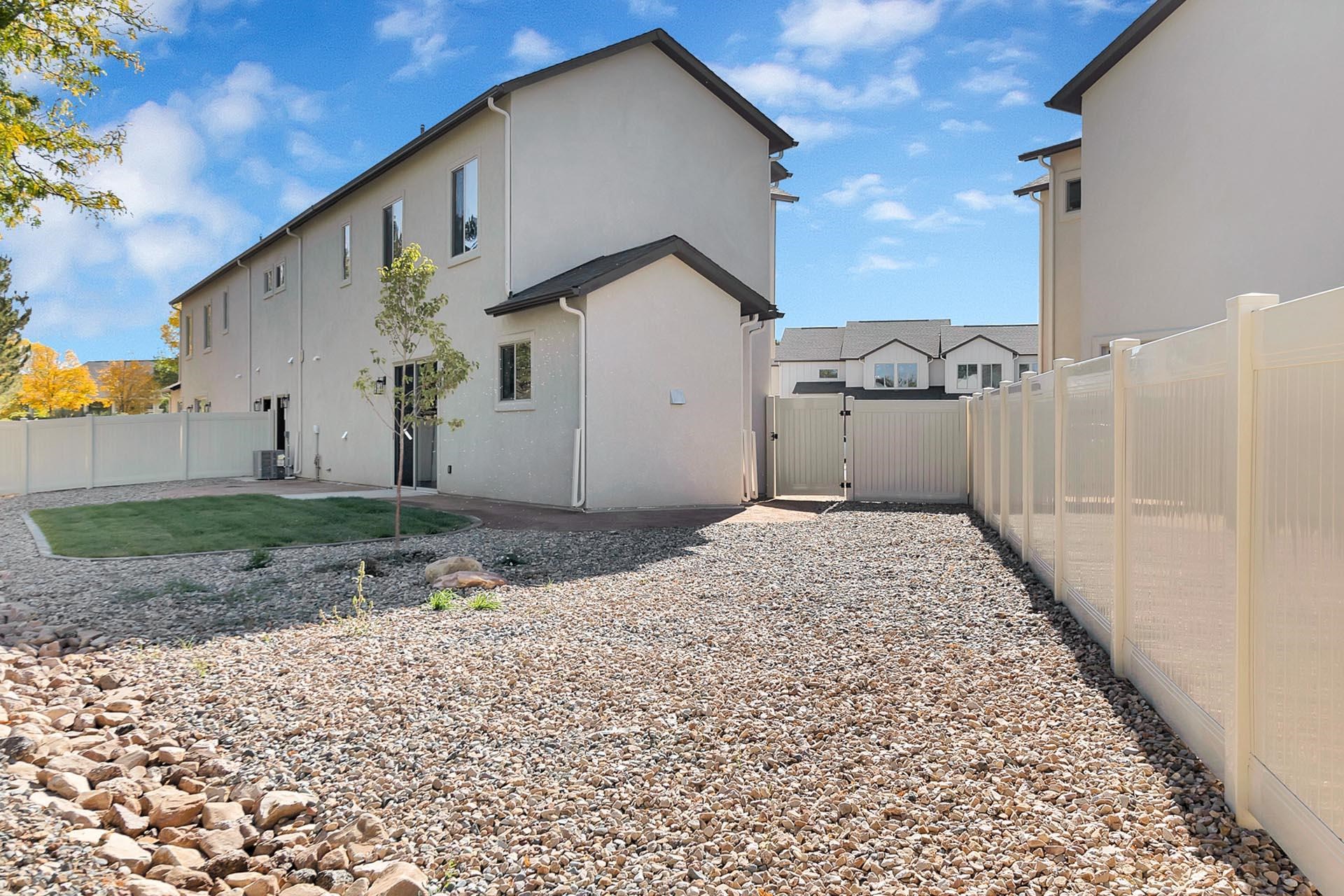 1111 Sprocket Court Fruita, CO 81521 - Photo 38 of 41 a view of a house with a yard