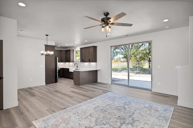 a kitchen with a stove and a microwave