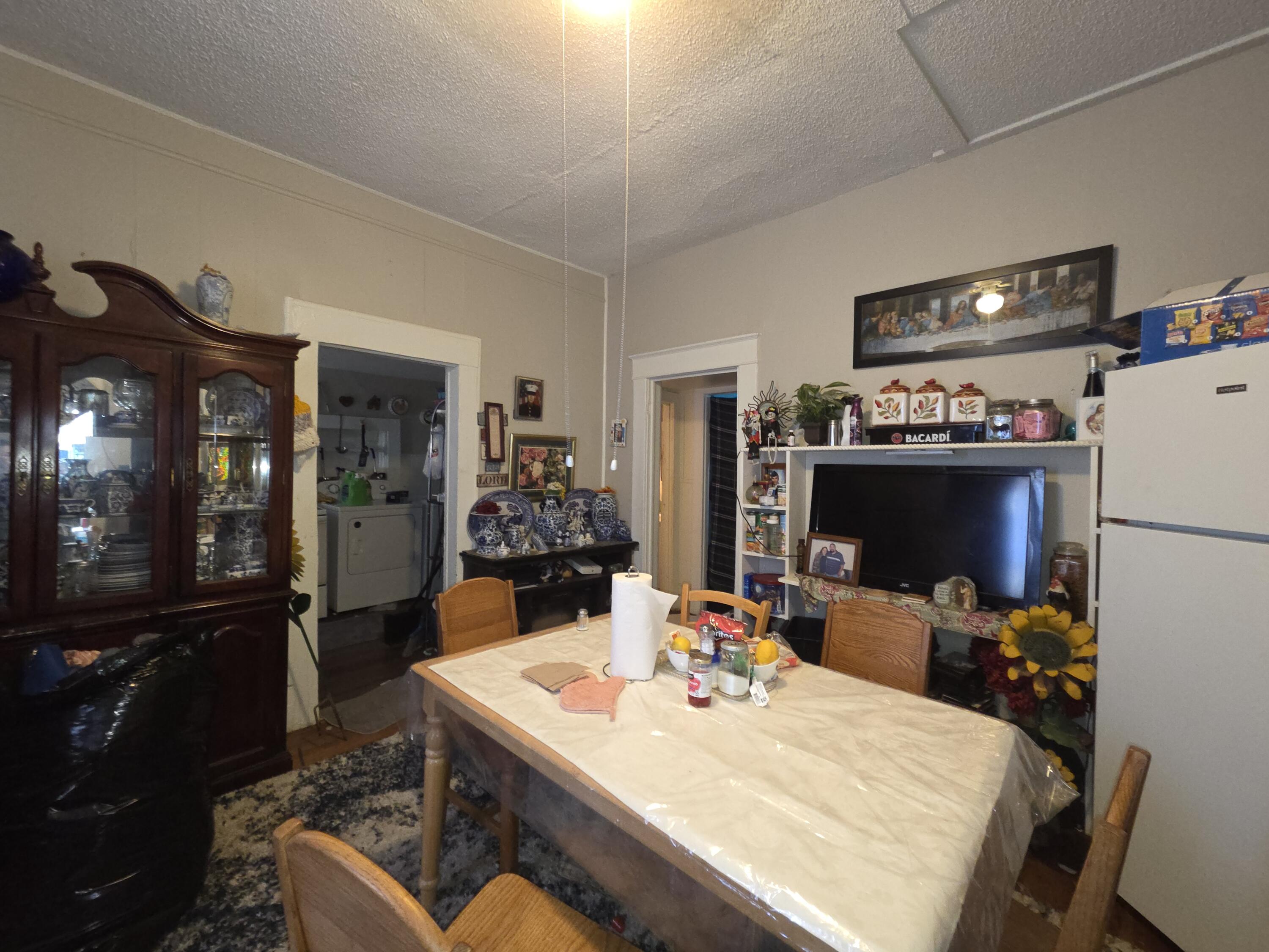 706 29th Street Lubbock, TX 79404 - Photo 3 of 8 a view of a dining room with furniture
