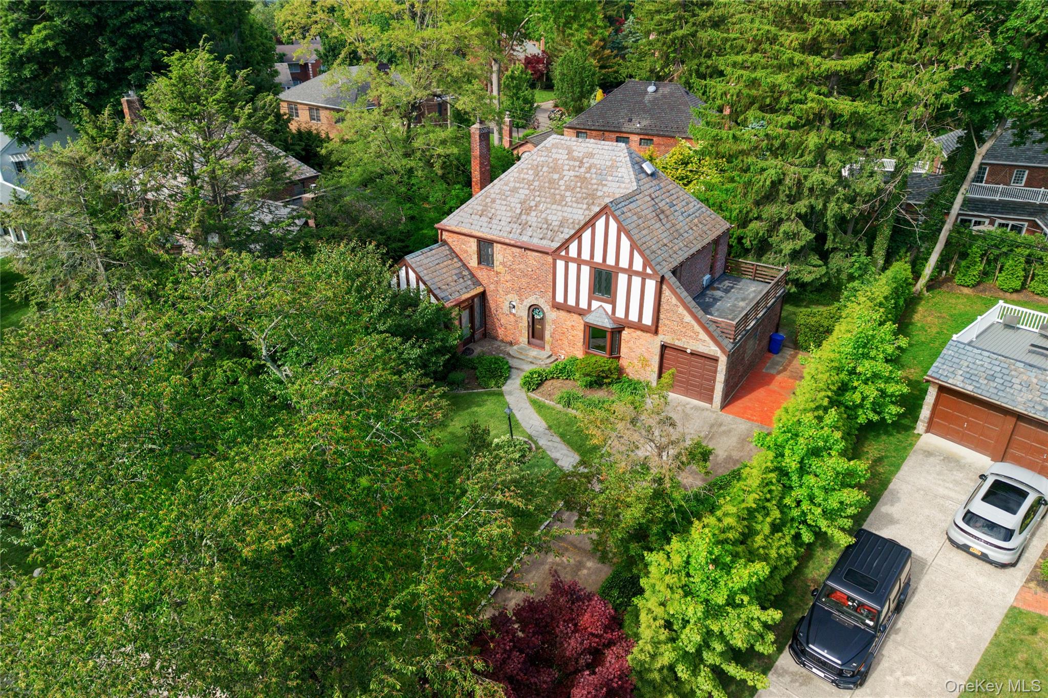 142 Mill Spring Road Manhasset, NY 11030 - Photo 2 of 23 an aerial view of a house