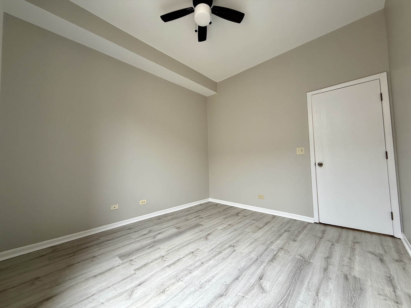 556 West 37th Street, Unit 3F Chicago, IL 60609 - Photo 9 of 12 wooden floor in an empty room