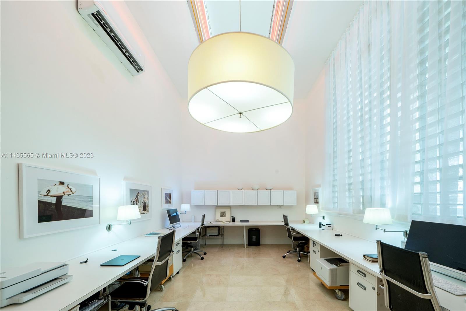 5959 La Gorce Drive Miami Beach, FL 33140 - Photo 23 of 60 a workspace with furniture