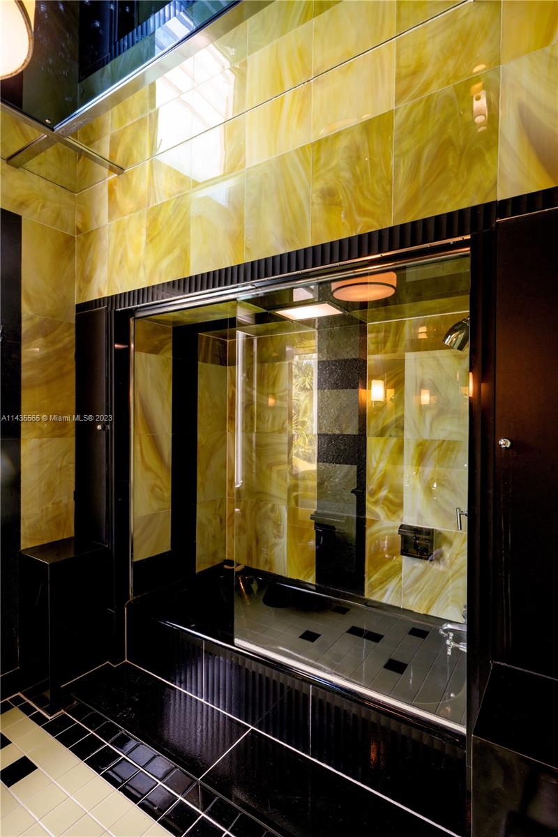 5959 La Gorce Drive Miami Beach, FL 33140 - Photo 34 of 60 a bathroom with a bathtub