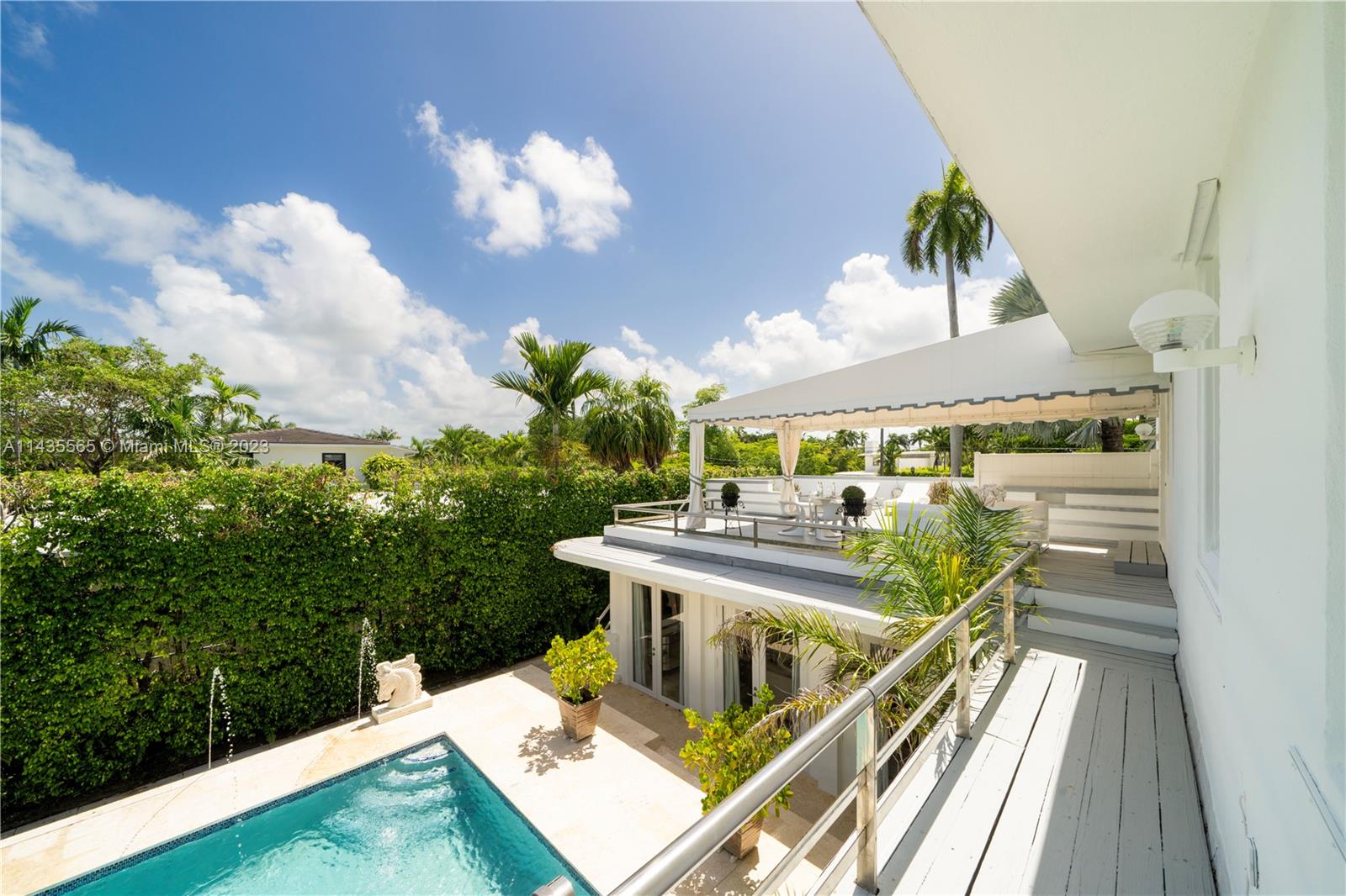5959 La Gorce Drive Miami Beach, FL 33140 - Photo 43 of 60 a view of a house with a patio