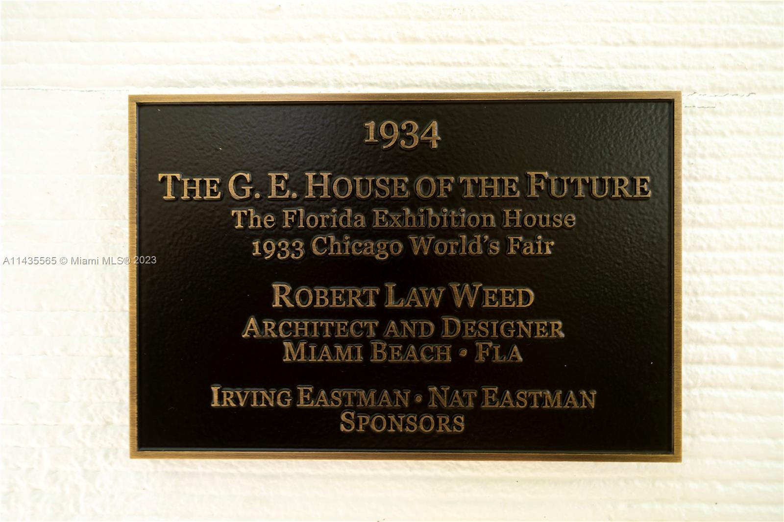 5959 La Gorce Drive Miami Beach, FL 33140 - Photo 53 of 60 a black and white photo of a book