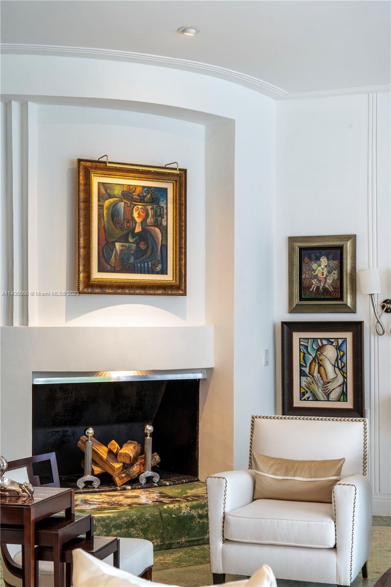 5959 La Gorce Drive Miami Beach, FL 33140 - Photo 9 of 60 a living room with furniture and a fireplace