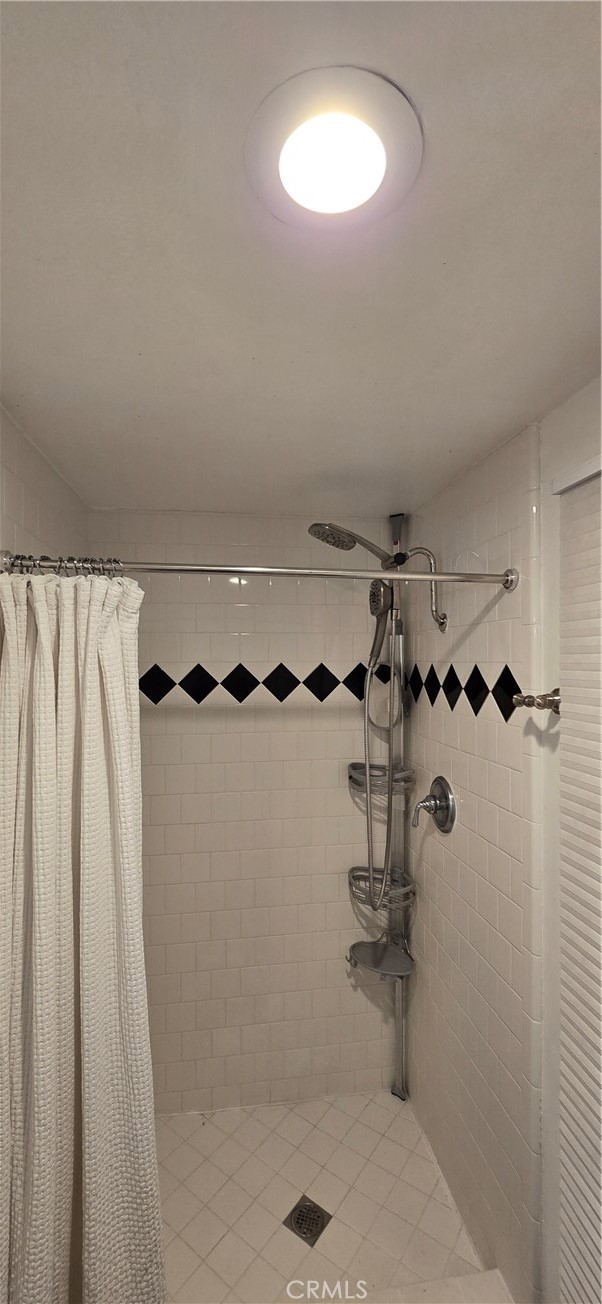 957 Magellan Street Costa Mesa, CA 92626 - Photo 12 of 24 a bathroom with a shower