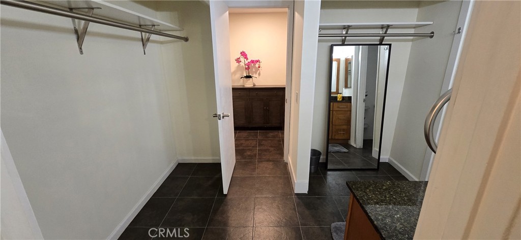 957 Magellan Street Costa Mesa, CA 92626 - Photo 13 of 24 a bathroom with a shower and a mirror