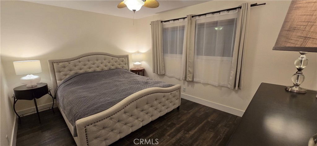 957 Magellan Street Costa Mesa, CA 92626 - Photo 15 of 24 a bedroom with a bed and a mirror