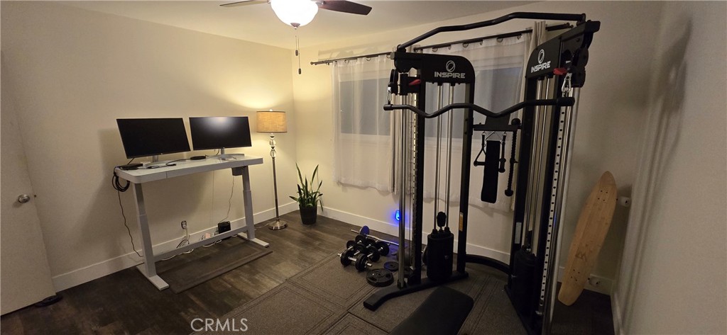 957 Magellan Street Costa Mesa, CA 92626 - Photo 21 of 24 a view of walk in closet with clothes and shoes