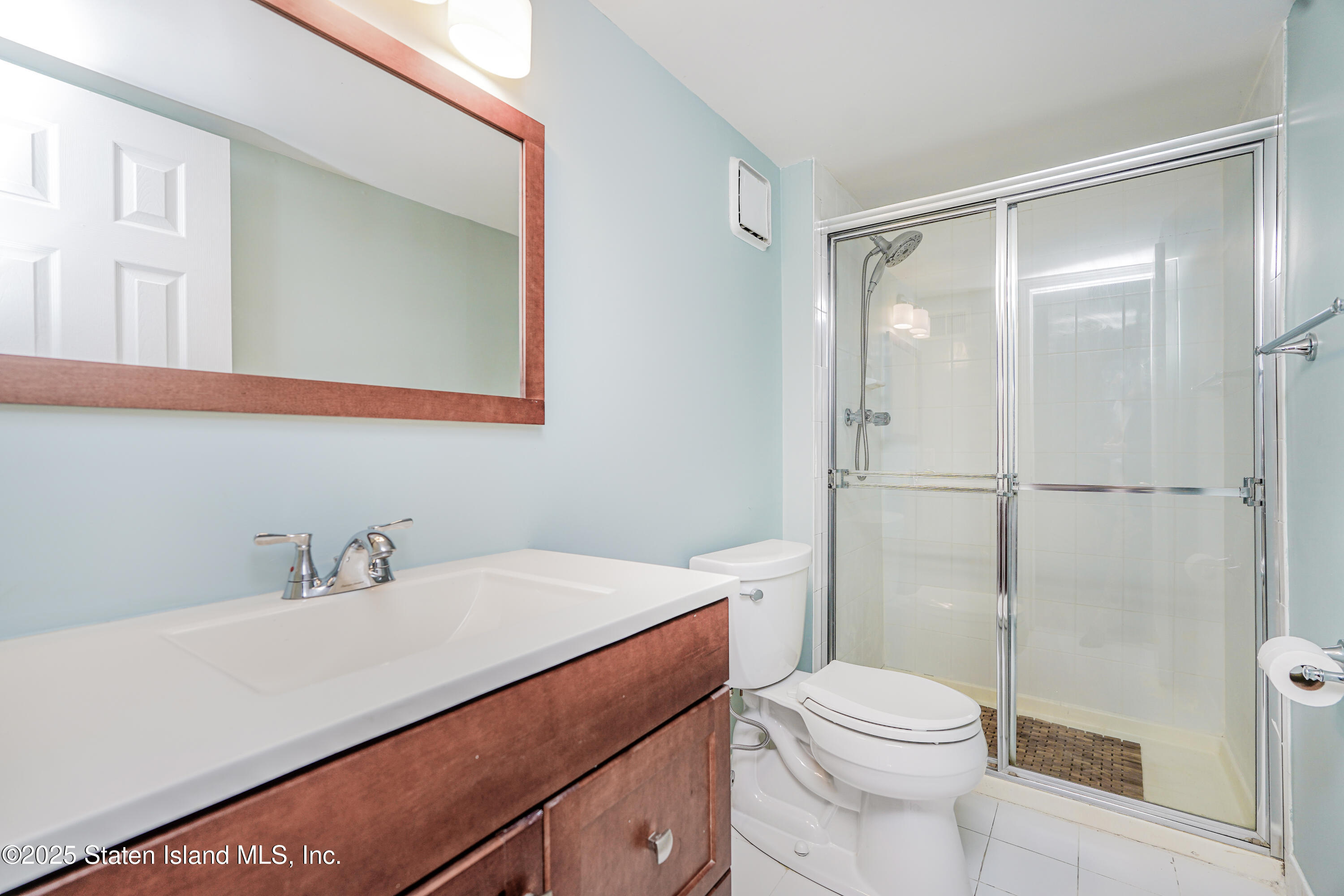 120 Pembrook Loop Staten Island, NY 10309 - Photo 14 of 24 a bathroom with a sink a toilet and shower
