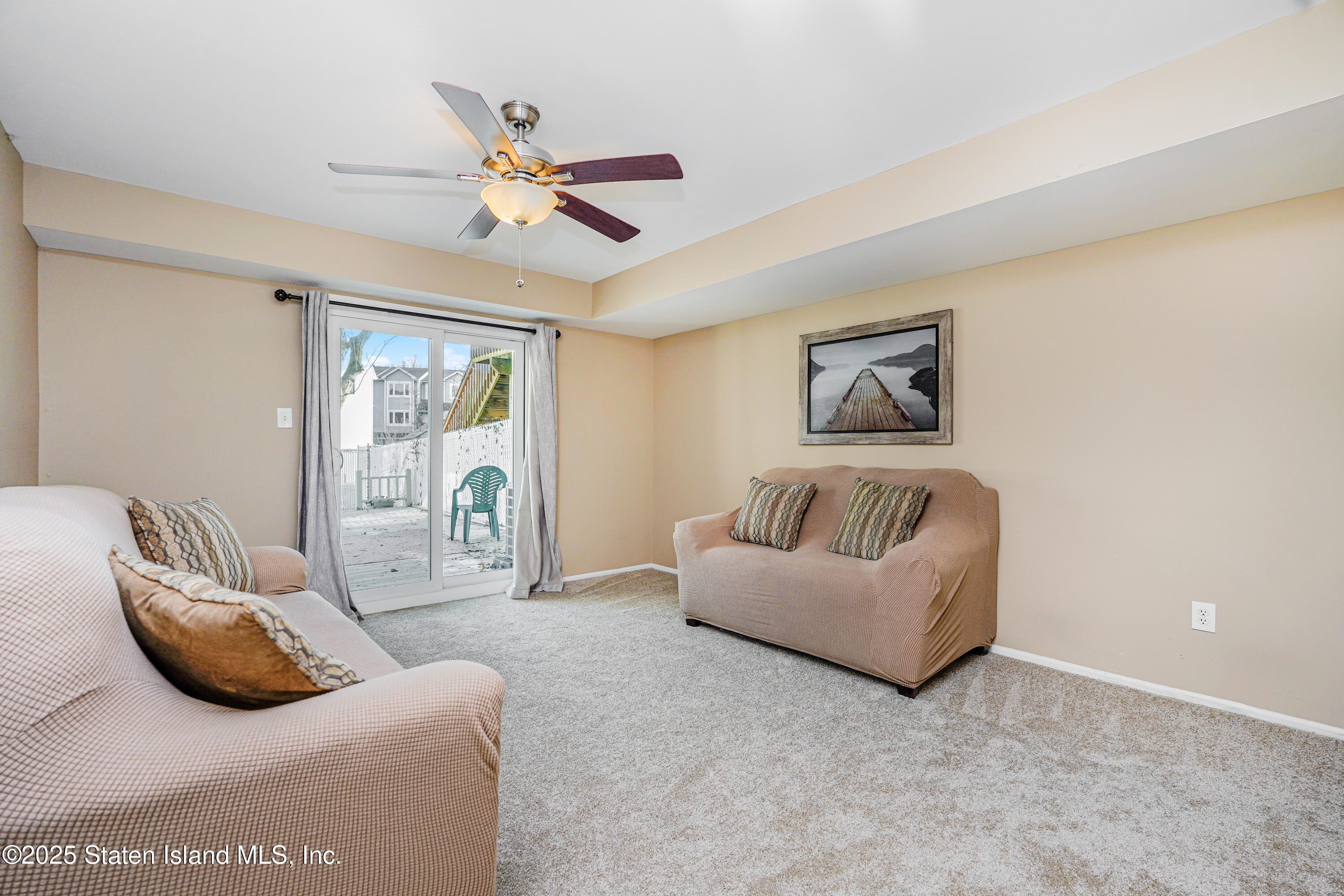 120 Pembrook Loop Staten Island, NY 10309 - Photo 15 of 24 a living room with furniture and ceiling fan