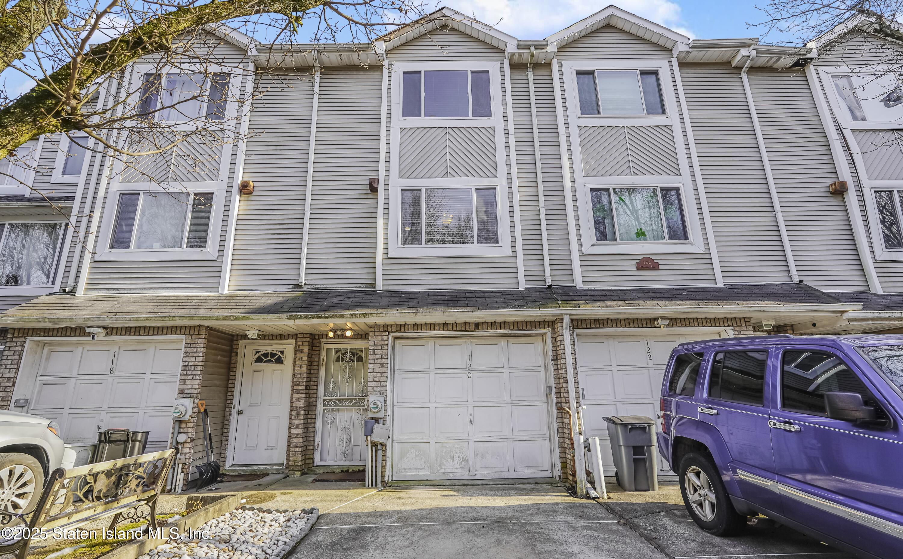 120 Pembrook Loop Staten Island, NY 10309 - Photo 2 of 24 a front view of a house with parking
