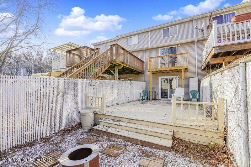 120 Pembrook Loop Staten Island, NY 10309 - Photo 24 of 24 a view of a house with a wooden fence
