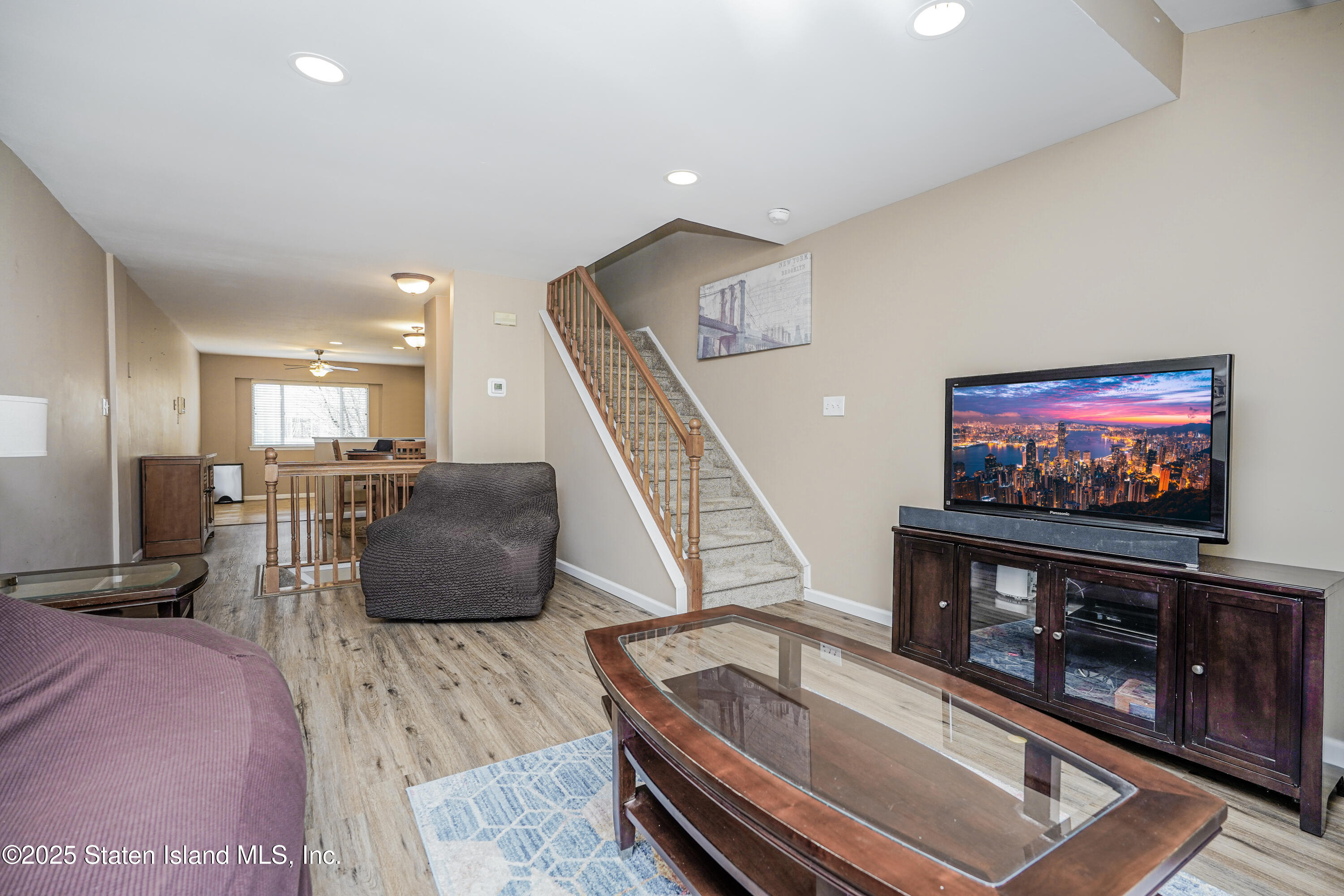 120 Pembrook Loop Staten Island, NY 10309 - Photo 3 of 24 a living room with furniture and a flat screen tv