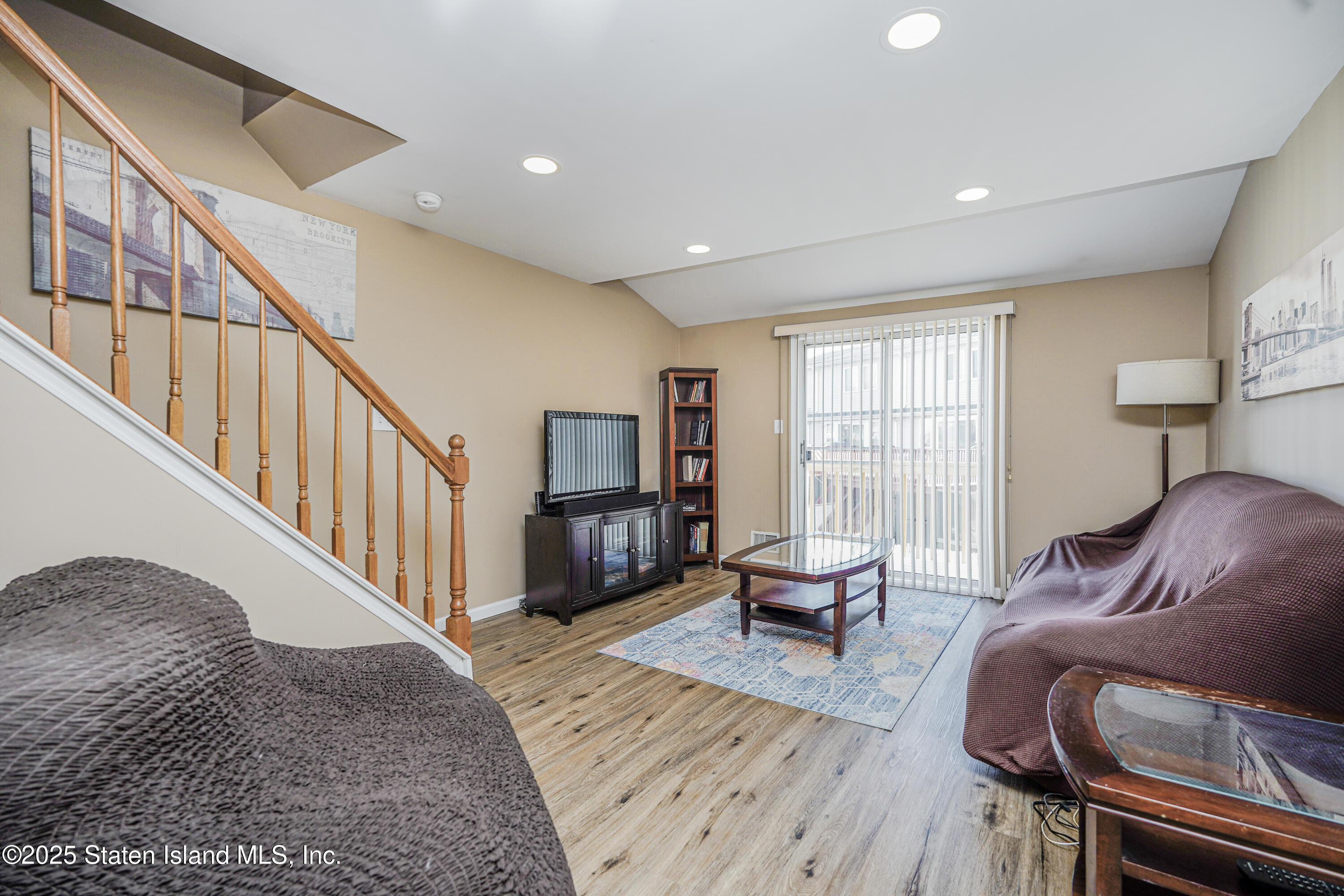 120 Pembrook Loop Staten Island, NY 10309 - Photo 4 of 24 a living room with furniture or couch and a wooden floor