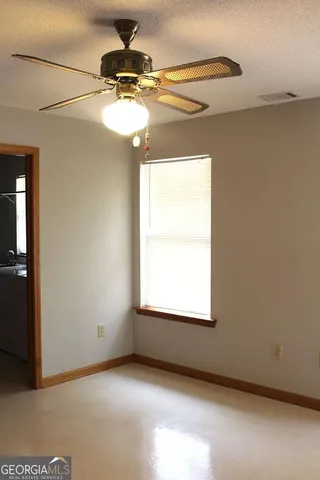 a view of a window in an empty room