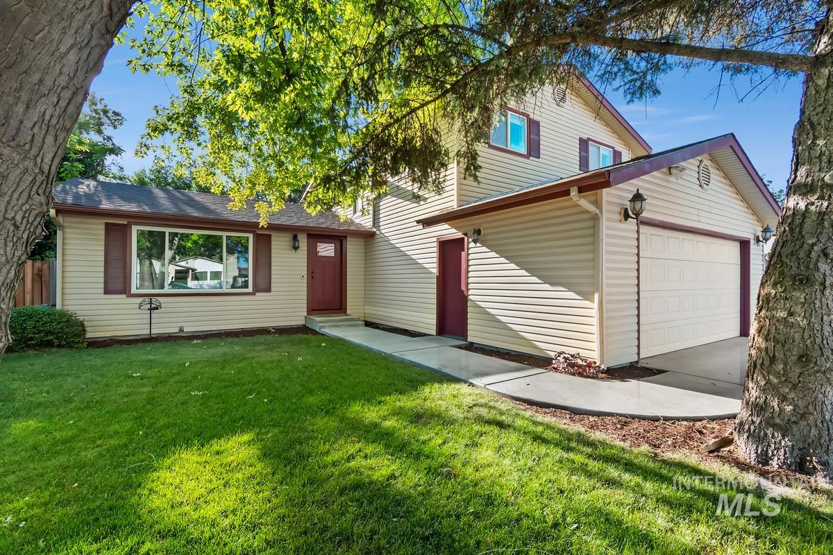 2330 Quicksilver Street Boise, ID 83705 - Photo 1 of 1 Two-story residence featuring light-colored siding with contrasting dark trim accents
