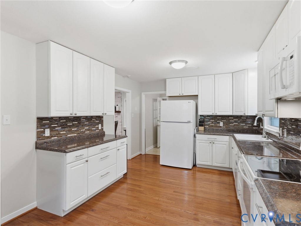 7707 Woodbrook Road Quinton, VA 23141 - Photo 5 of 42 Contemporary kitchen featuring white cabinetry, da