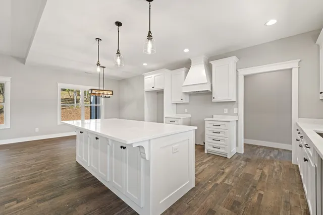 a bathroom with a bathtub a sink and a shower