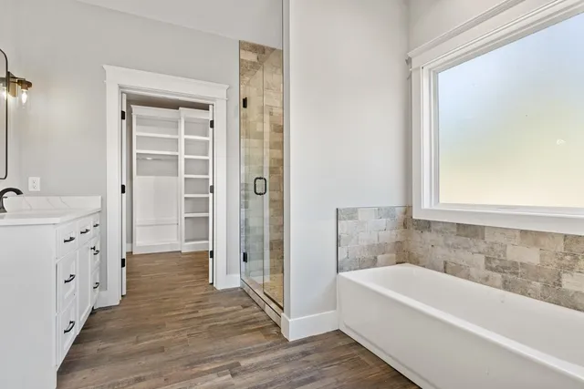 a white toilet sitting next to a bathroom sink