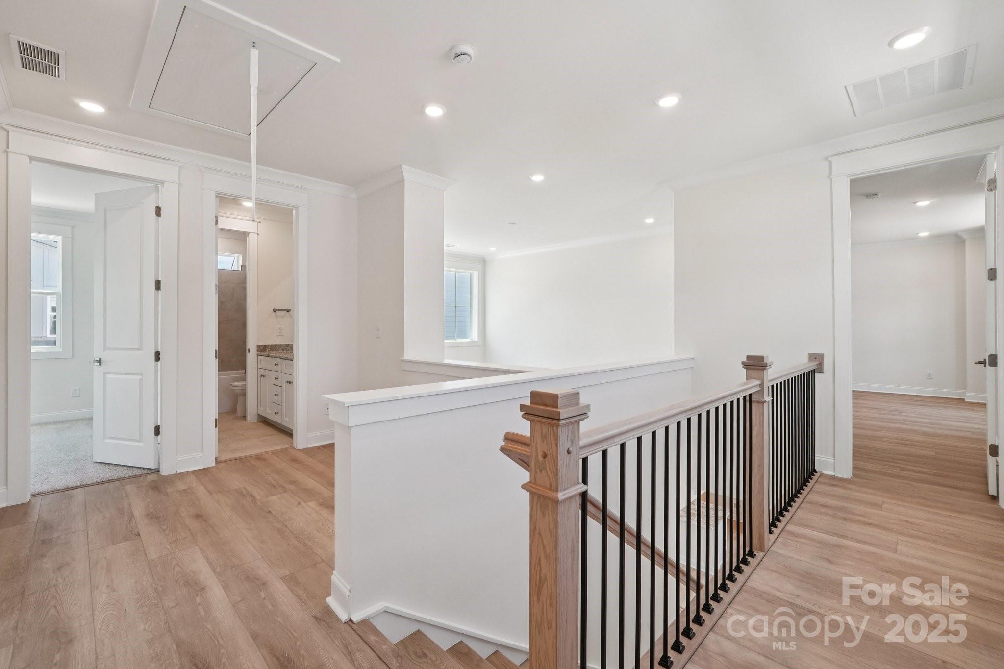 908 Coast Drive Tega Cay, SC 29708 - Photo 7 of 14 a view of a hallway with a livingroom