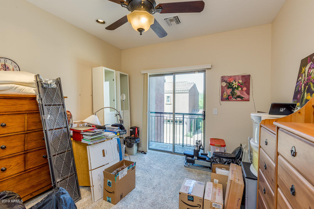 3935 East Rough Rider Road, Unit 1241 Phoenix, AZ 85050 - Photo 30 of 45 a room with storage and utility