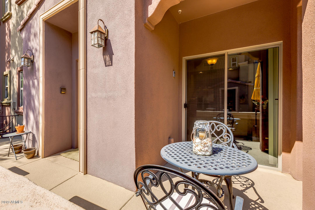 3935 East Rough Rider Road, Unit 1241 Phoenix, AZ 85050 - Photo 34 of 45 a dining room with furniture and window