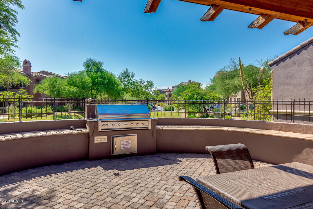 3935 East Rough Rider Road, Unit 1241 Phoenix, AZ 85050 - Photo 38 of 45 a outdoor view with a sitting space