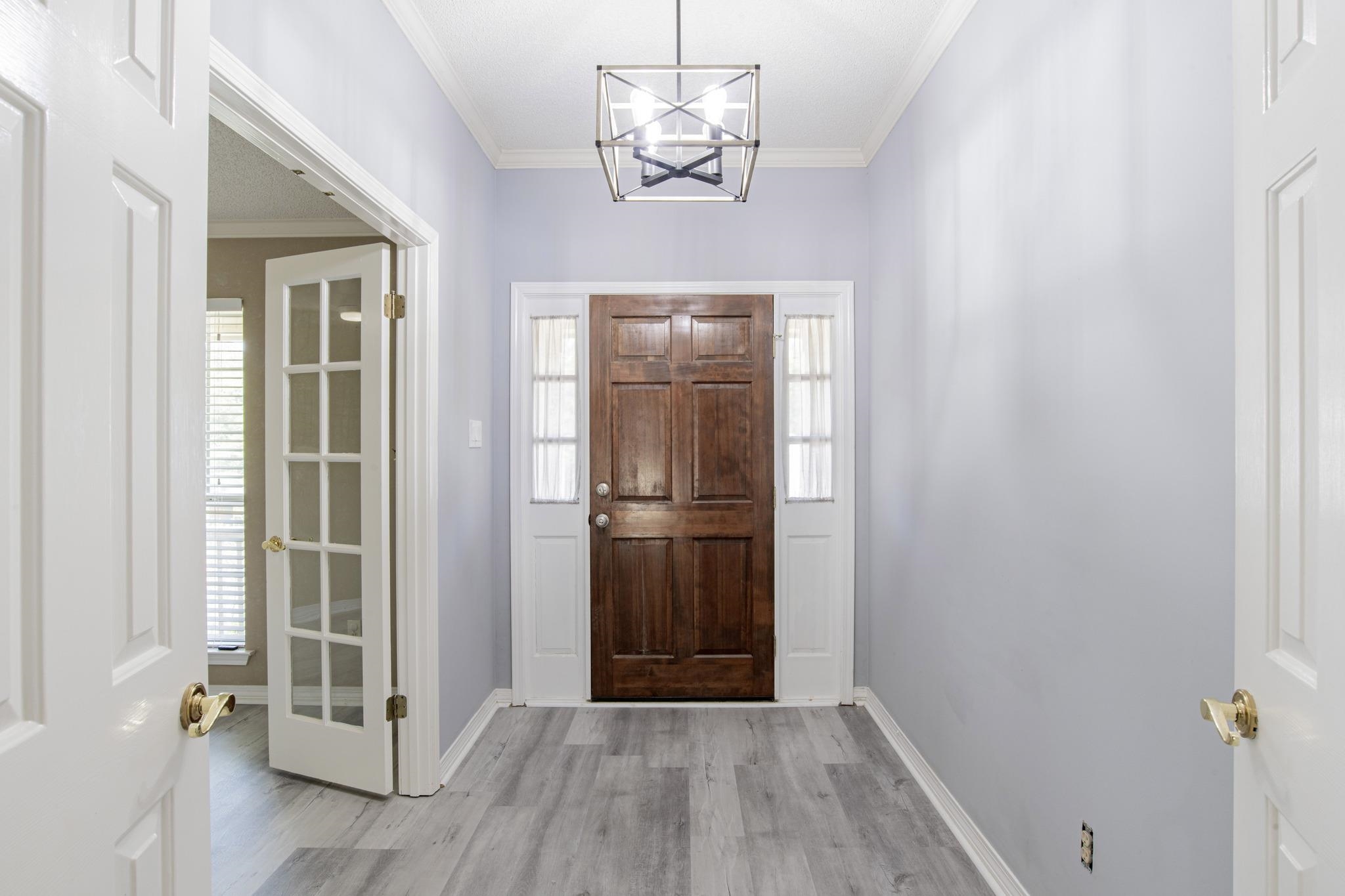 129 Lakeview Loop Daphne, AL 36526 - Photo 18 of 28 Foyer Doors Lead to Offic