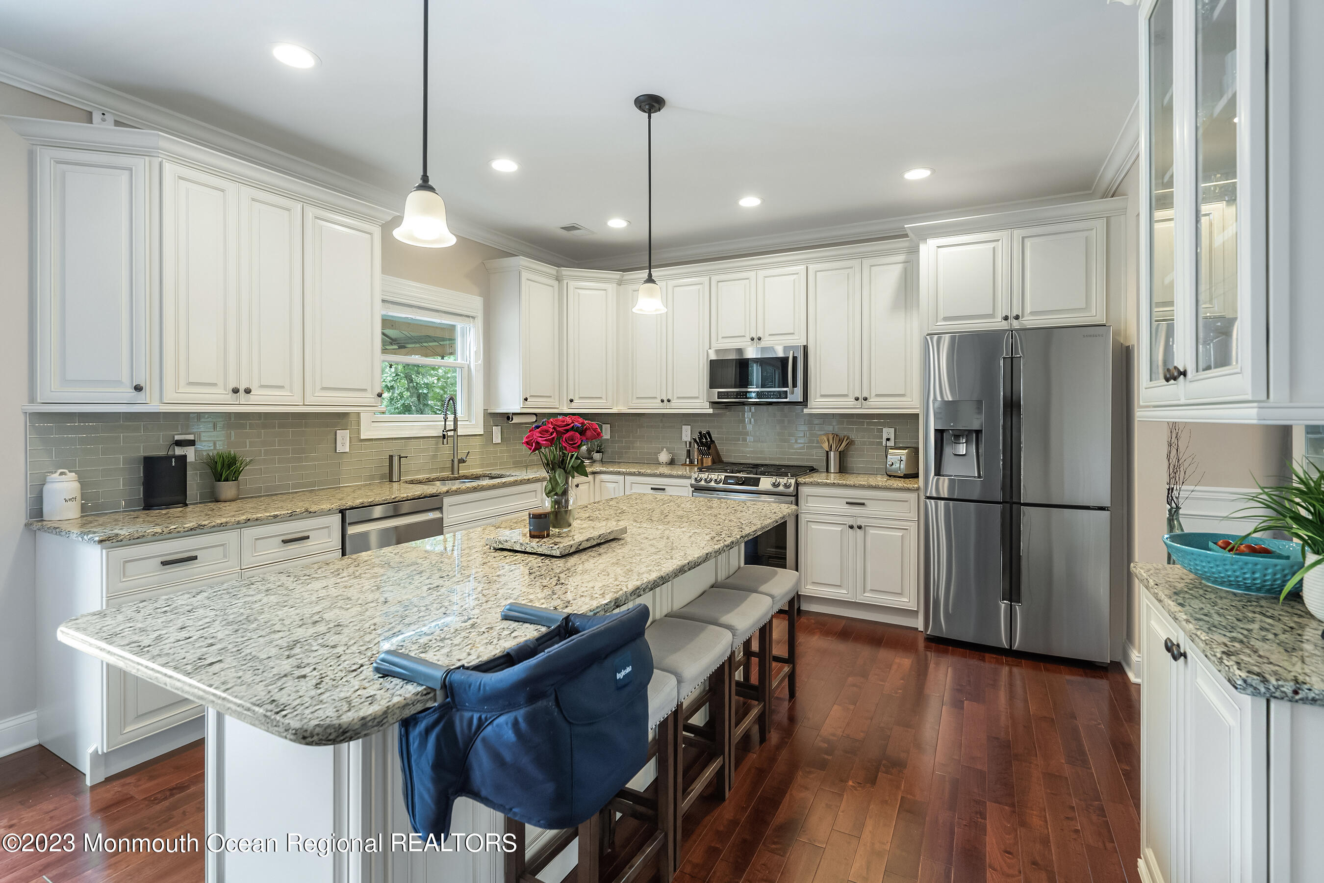 108 Wiseman Road Jackson, NJ 08527 - Photo 14 of 42 a kitchen with refrigerator and white cabinets