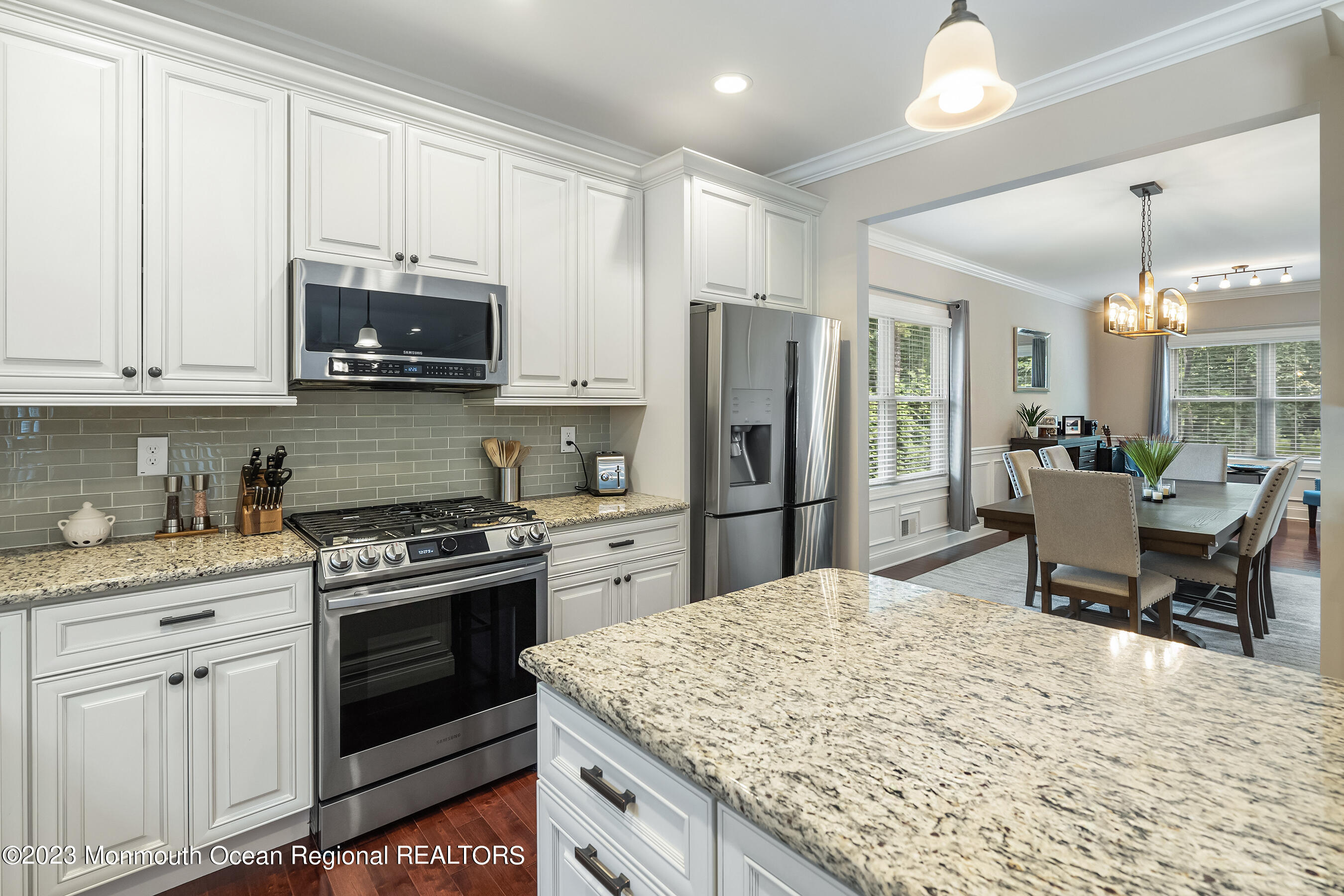 108 Wiseman Road Jackson, NJ 08527 - Photo 15 of 42 a kitchen with stainless steel appliances granite countertop a stove refrigerator sink and cabinets