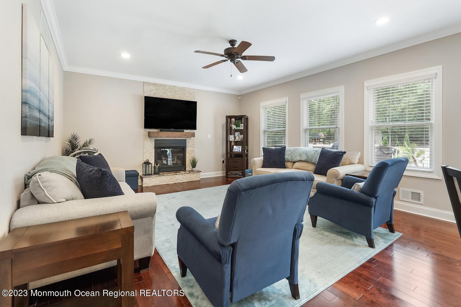 108 Wiseman Road Jackson, NJ 08527 - Photo 17 of 42 a living room with furniture and a flat screen tv